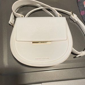 Katie Loxton white handbag. Has some scruffs. See photos for defects.